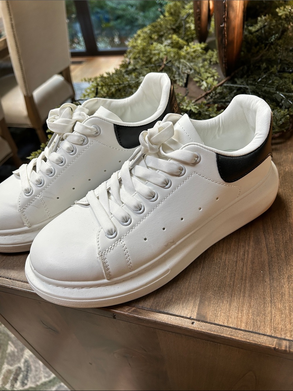 White Low-Top Sneakers with Black Heel Accent like new ! Worn once . Size 41